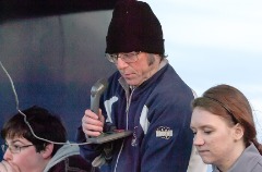 Cash serving as public address announcer during a George Fox women’s soccer game.